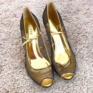 Black fishnet and gold open toe heels